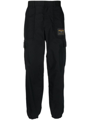 

Logo-patch cargo trousers, Moschino Logo-patch cargo trousers