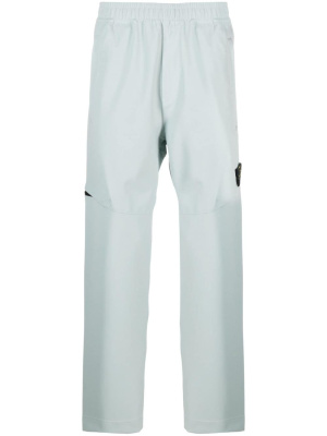 

Logo-patch track pants, Stone Island Logo-patch track pants