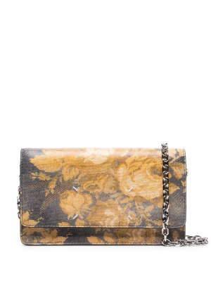 

Flora-print clutch bag, Maison Margiela Flora-print clutch bag