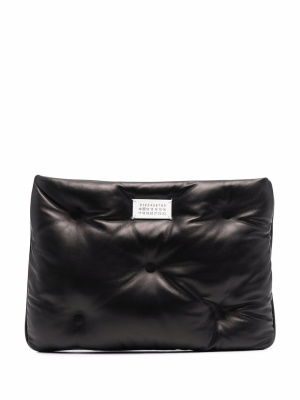 

Logo-plaque padded leather clutch bag, Maison Margiela Logo-plaque padded leather clutch bag