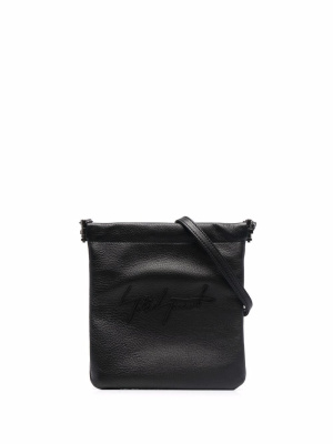 

Logo-embroidered leather crossbody bag, Discord Yohji Yamamoto Logo-embroidered leather crossbody bag