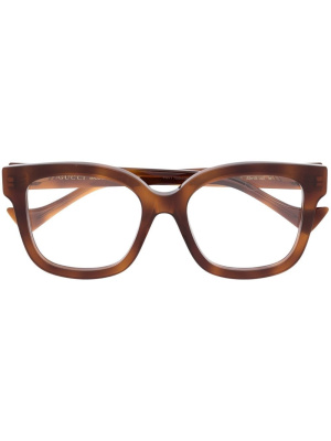 

Tortoiseshell-effect logo glasses, Gucci Eyewear Tortoiseshell-effect logo glasses