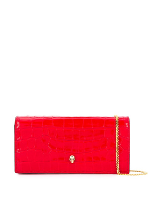 

Embossed skull clutch bag, Alexander McQueen Embossed skull clutch bag
