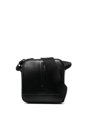 

Embossed-logo messenger bag, Calvin Klein Embossed-logo messenger bag