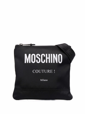 

Logo-print panelled messenger bag, Moschino Logo-print panelled messenger bag