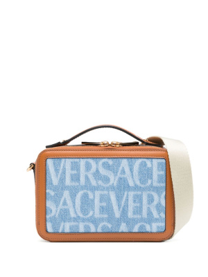 

Allover-print denim messenger bag, Versace Allover-print denim messenger bag