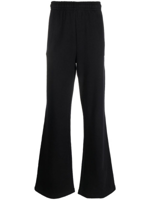 

Logo-print cotton track pants, 032c Logo-print cotton track pants