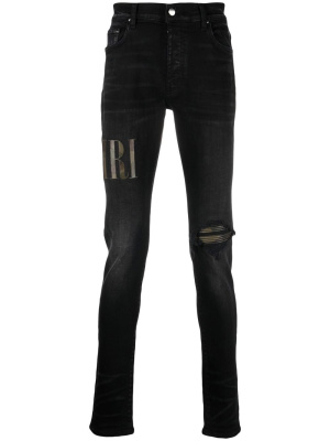 

Leather logo-patch skinny jeans, AMIRI Leather logo-patch skinny jeans