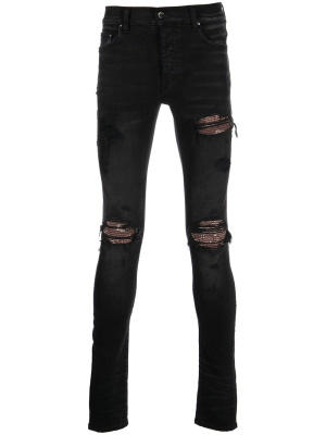 

Paisley-patch distressed skinny jeans, AMIRI Paisley-patch distressed skinny jeans