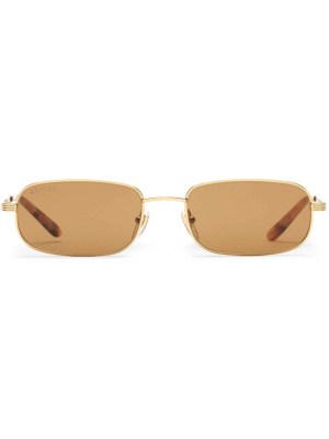 

Rectangle-frame tinted sunglasses, Gucci Eyewear Rectangle-frame tinted sunglasses