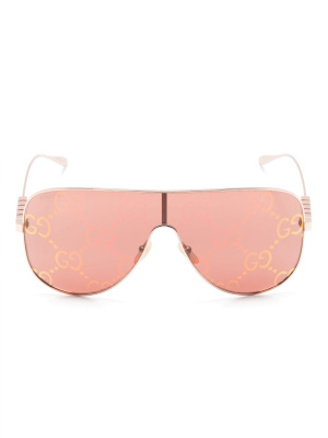 

Logo-lettering mask-frame sunglasses, Gucci Eyewear Logo-lettering mask-frame sunglasses