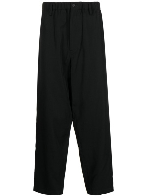 

Elasticated-waist tapered-leg trousers, Yohji Yamamoto Elasticated-waist tapered-leg trousers