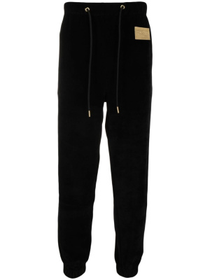 

Logo-plaque velvet track trousers, Moschino Logo-plaque velvet track trousers