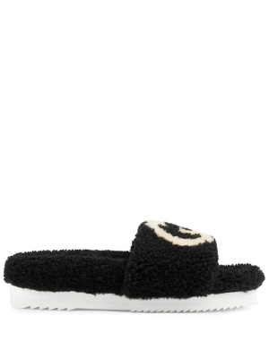 

Interlocking G shearling slides, Gucci Interlocking G shearling slides