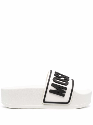 

Logo embossed platform slides, Moschino Logo embossed platform slides