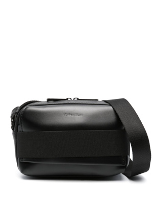 

Logo-lettering faux-leather messenger bag, Calvin Klein Logo-lettering faux-leather messenger bag