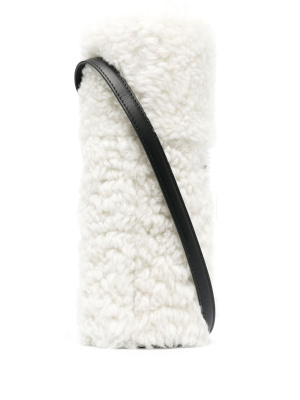 

Thermos bottle and shearling case, Jil Sander Thermos bottle and shearling case