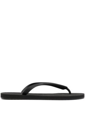 

Logo-embossed flip flops, VETEMENTS Logo-embossed flip flops