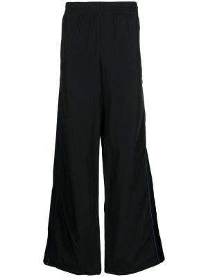 

Logo-print track pants, Martine Rose Logo-print track pants