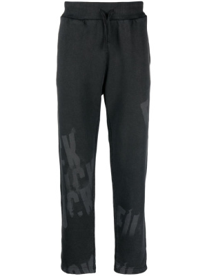 

Slogan-print cotton track trousers, 1017 ALYX 9SM Slogan-print cotton track trousers