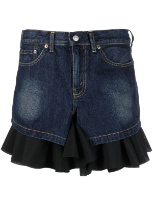 

Ruffled-hem denim skirt, Junya Watanabe Ruffled-hem denim skirt