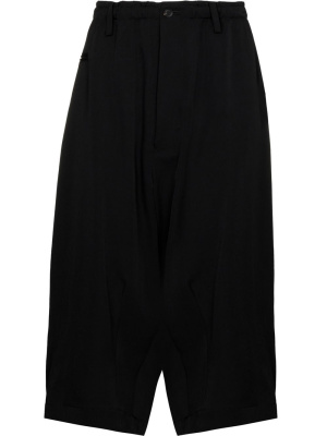 

Cropped wide-leg wool trousers, Yohji Yamamoto Cropped wide-leg wool trousers