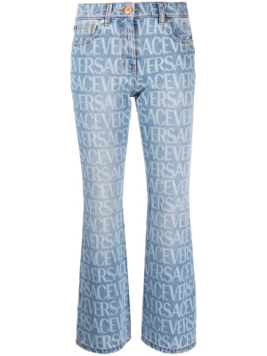 

Mid-rise logo-print bootcut jeans, Versace Mid-rise logo-print bootcut jeans