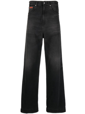 

Logo-patch wide-leg jeans, Martine Rose Logo-patch wide-leg jeans