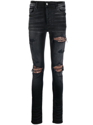 

Ripped skinny-fit jeans, AMIRI Ripped skinny-fit jeans