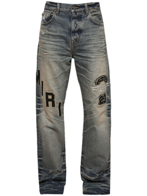 

Logo-patch distressed jeans, AMIRI Logo-patch distressed jeans
