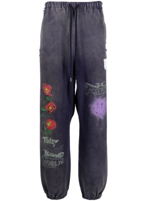 

Slogan-print cotton track pants, Maison Mihara Yasuhiro Slogan-print cotton track pants