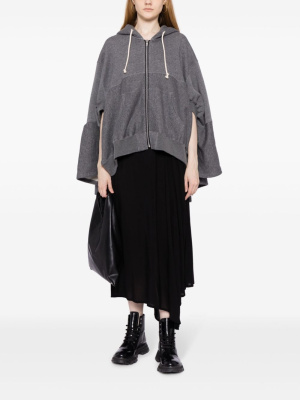 

Ruffle-hem hooded poncho, Junya Watanabe Ruffle-hem hooded poncho