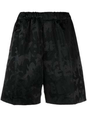 

Graffiti-print shorts, Alexander McQueen Graffiti-print shorts