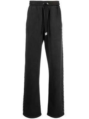 

Eyelet-embellished track pants, Off-White Eyelet-embellished track pants