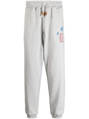 

Alkhws logo-print cotton track pants, Adish Alkhws logo-print cotton track pants