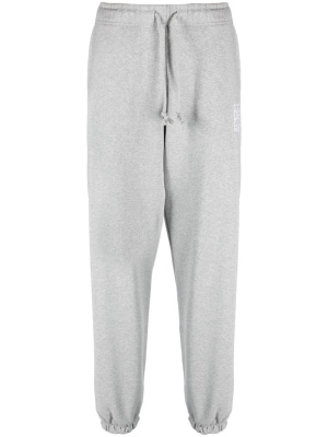 

Logo-print tapered track pants, PACCBET Logo-print tapered track pants