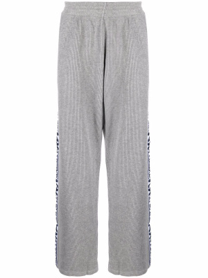 

Logo-tape corduroy track pants, Martine Rose Logo-tape corduroy track pants