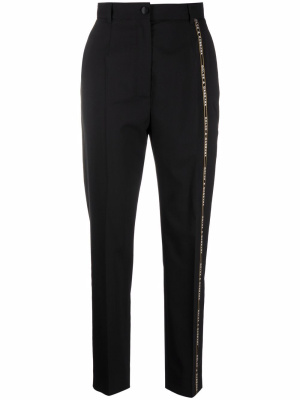 

Logo-trim tapered-leg tailored trousers, Dolce & Gabbana Logo-trim tapered-leg tailored trousers